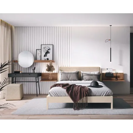 Dormitorio con cama completa tapizada